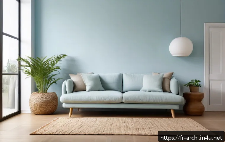 건축과 디자인 심리학 - A serene and cozy modern living room interior featuring a soft light blue accent wall that promotes ...